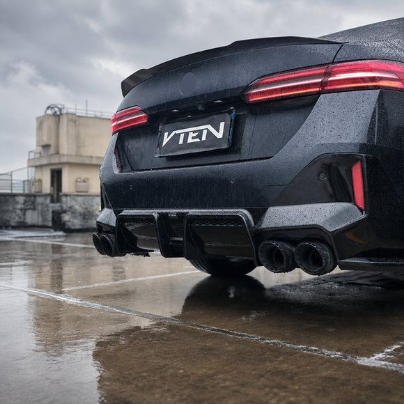 SuperAutoUSA VTEN style gloss black quad exhaust tips installed on a 2024 BMW 5 Series G60 sedan