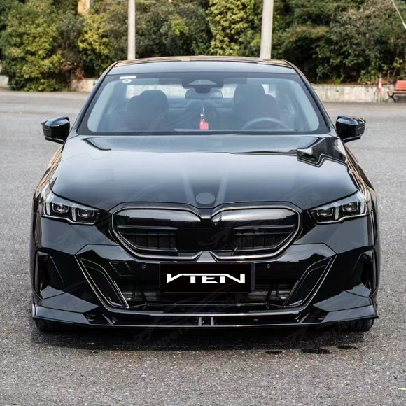SuperAutoUSA VTEN style gloss black front lip splitter installed on a 2024 BMW 5 Series G60 sedan