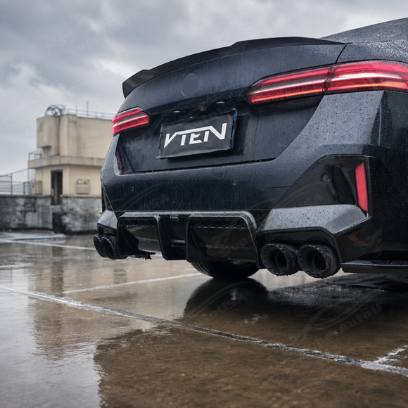 SuperAutoUSA VTEN style gloss black rear diffuser installed on a 2024 BMW 5 Series G60 sedan