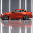 Direct side profile showcasing the sculpted M2-inspired muscular aero lines and wider lower rocker stance