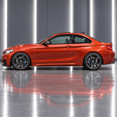 Direct side profile showcasing the sculpted M2-inspired muscular aero lines and wider lower rocker stance