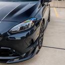 Gloss black SuperAutoUSA VTEN front canards providing sharp contrast on a Thundernight Metallic BMW 2 Series F74