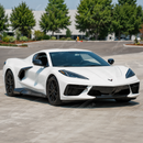3K twill carbon fiber exotic side skirts providing contrast on a Torch Red Chevrolet Corvette C8