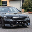 High-contrast look of the SuperAutoUSA VTEN gloss black bumper lip accenting an Alpine White 2025 BMW G60
