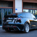 Stealth look of the SuperAutoUSA VTEN gloss black spoiler accenting a Solid Black Tesla Model Y