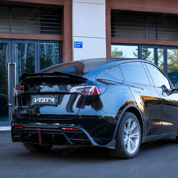 Detailed close-up of the mirror-finish gloss black clear coat on the SuperAutoUSA rear diffuser panel