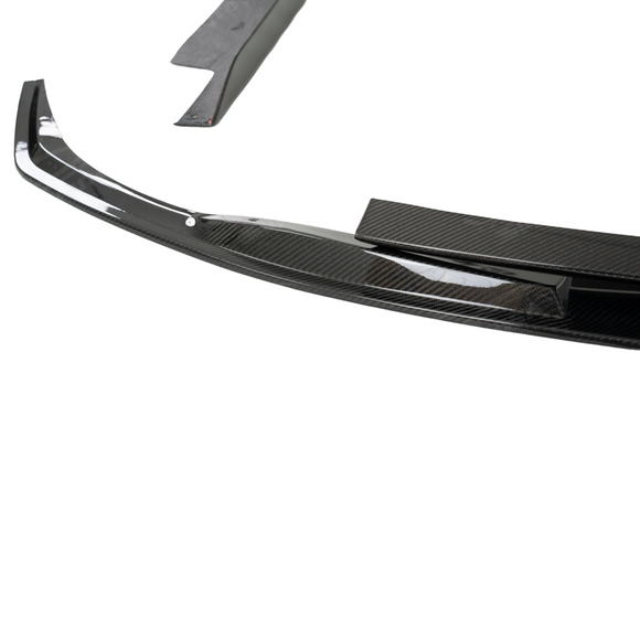 Extreme close-up of the premium 3K twill real carbon fiber weave on the Acura TLX aero components