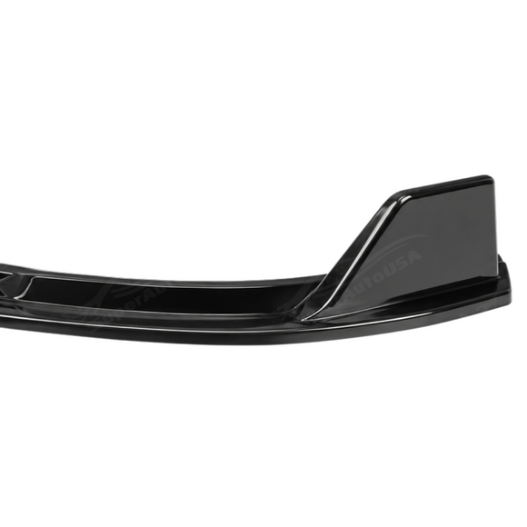 Close-up view showing the mirror-finish gloss black clear coat on the VTEN front bumper lip