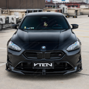 Sporty visual transformation of the VTEN gloss black front lip accenting an Alpine White 2026 BMW F74