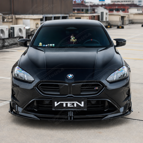 Sporty visual transformation of the VTEN gloss black front lip accenting an Alpine White 2026 BMW F74