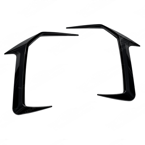 Track-level shot showing the dual-tier front canard layout on the G60 front bumper air intakes