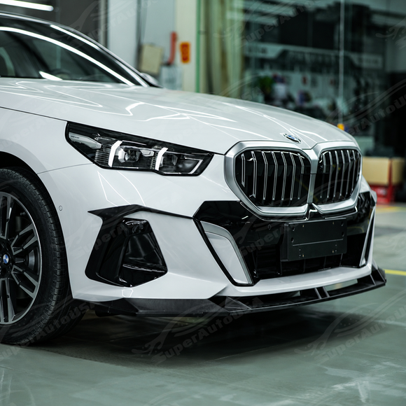 Sporty visual transformation of the SuperAutoUSA VTEN gloss black canards accenting an Alpine White 2025 BMW G60