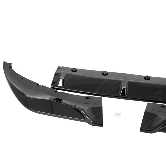 Gloss black 3-piece front bumper lip spoiler installed on a 2020 BMW 7 Series G12