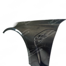 M style carbon fiber fender integrated on a black BMW F10