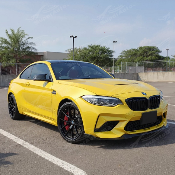CS Style carbon fiber bumper cover integrated on a black BMW F87 M2