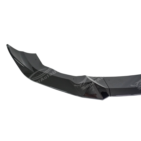 Full front view of a BMW F87 M2 with front lip kit