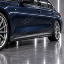 M-Performance style rocker panel side skirt extensions installed on a 2019-2026 BMW 3-Series G20 sedan
