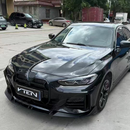 Sleek, aggressive ground-effects integration on a Black Sapphire Metallic BMW 430i / M440i Gran Coupe