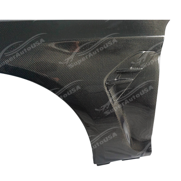 Real carbon fiber M style front side vented fender panel on a white BMW G30