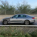 Uninstalled real carbon fiber M style front side vented fender panel, top view