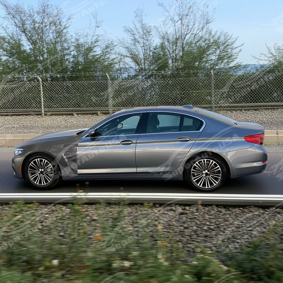 Uninstalled real carbon fiber M style front side vented fender panel, top view