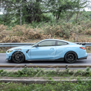 Angled front-side view of G82 showing SuperAutoUSA fender