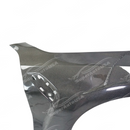 Uninstalled SuperAutoUSA real carbon fiber front side vented fender panel, top view