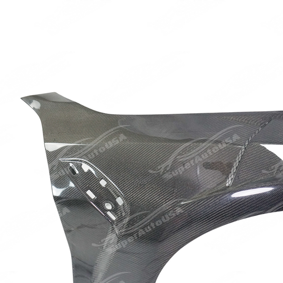 Uninstalled SuperAutoUSA real carbon fiber front side vented fender panel, top view
