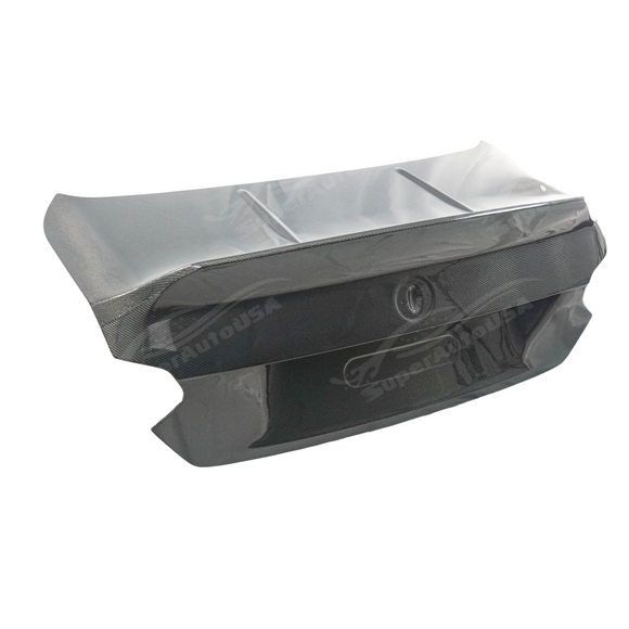  Underside view of uninstalled carbon fiber trunk cover showing mounting points