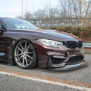 Full front view of a 2015 BMW M4 with new SuperAutoUSA front splitter