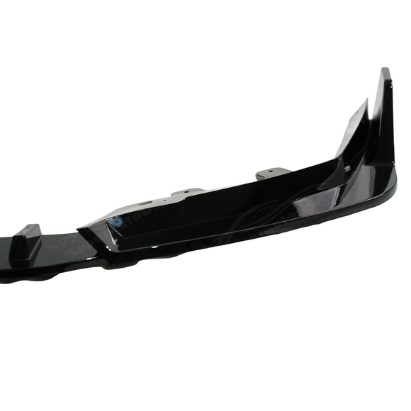 Detailed shot of the UV-resistant high-gloss clear coat on the SuperAutoUSA M5 front lip