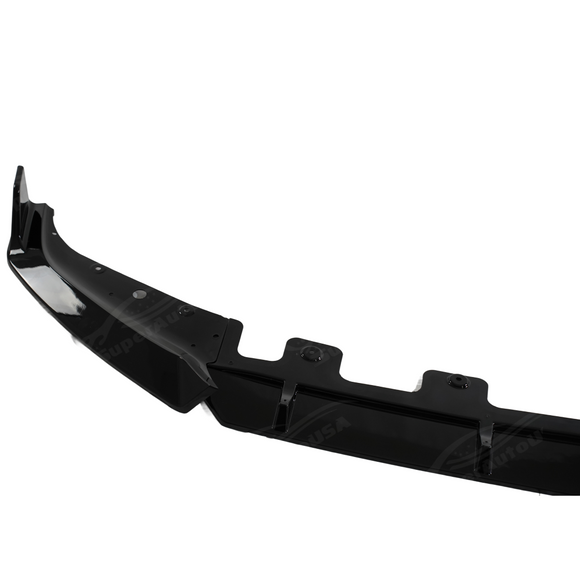 Close-up of the premium mirror-finish gloss black coating on the SuperAutoUSA X1 front splitter