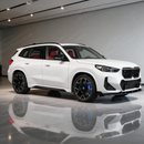Precision SuperAutoUSA fitment along the M-Sport style bumper of a 2025 BMW X1