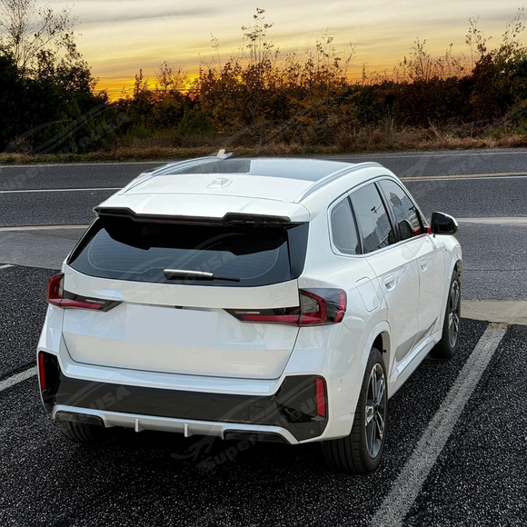 Uninstalled VTEN gloss black roof spoiler, top view