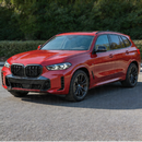 Detailed shot of the reinforced factory-style mounting clips on the SuperAutoUSA X5 grille