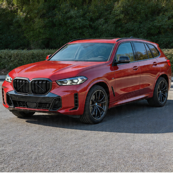 Detailed shot of the reinforced factory-style mounting clips on the SuperAutoUSA X5 grille
