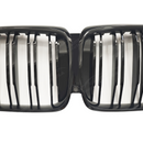Close-up of the premium mirror-finish gloss black coating on the SuperAutoUSA X5 kidney grille