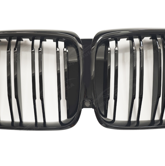 Close-up of the premium mirror-finish gloss black coating on the SuperAutoUSA X5 kidney grille