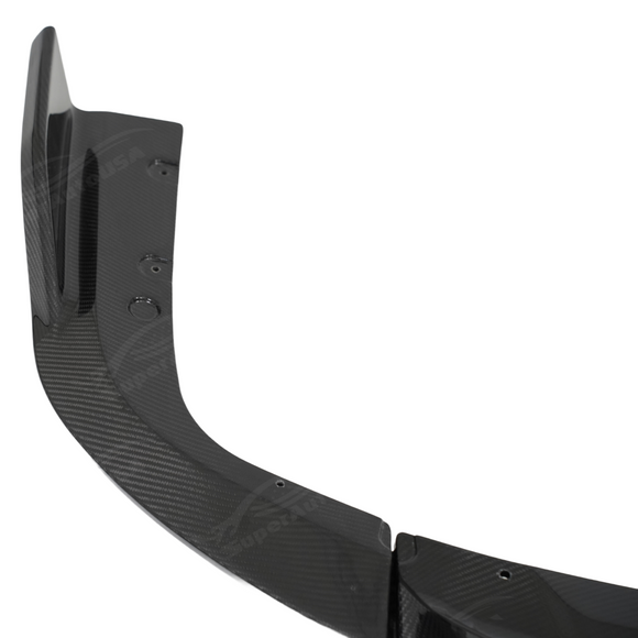 Close-up showing perfect exhaust tip integration with the SuperAutoUSA BMW X5 rear diffuser