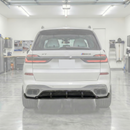 Direct rear view of the authentic double carbon fiber diffuser for 2019-2026 BMW X7
