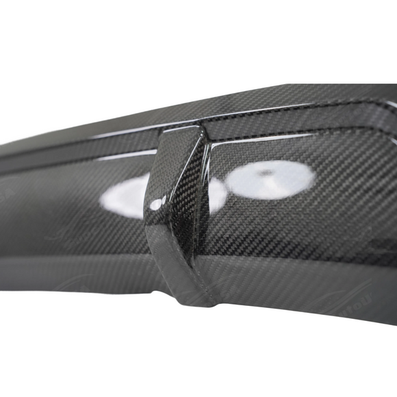 Close-up highlighting the ripple-free, mirror-like surface of the premium carbon fiber