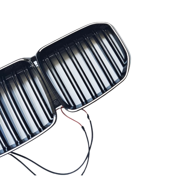 Close-up of the integrated LED light strip and gloss black finish on the SuperAutoUSA X7 grille