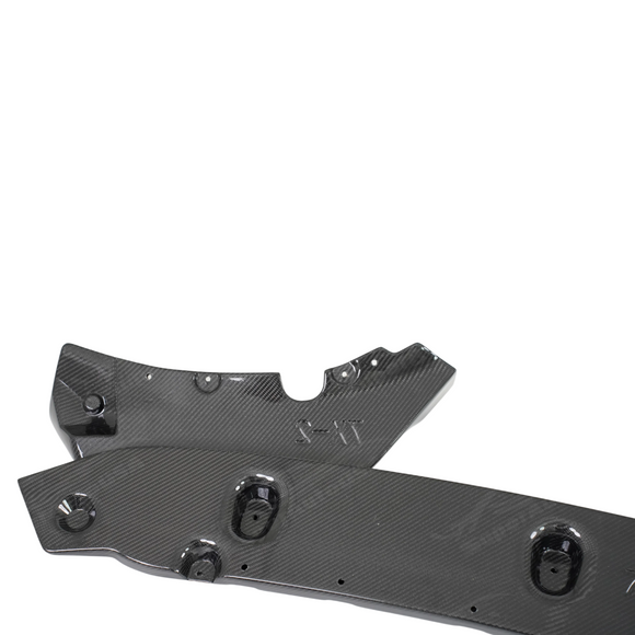 Detailed shot of the UV-resistant high-gloss clear coat on the SuperAutoUSA X7 carbon lip