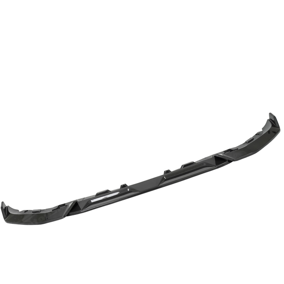 Detailed shot of the UV-resistant high-gloss clear coat on the BMW X7 double carbon lip