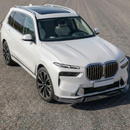 Direct front-facing view of the authentic double carbon fiber splitter for 2023-2026 BMW X7