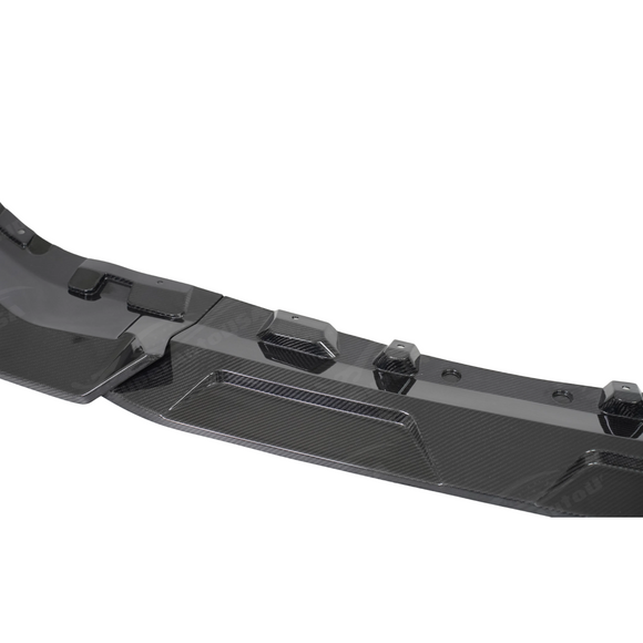 Close-up highlighting the ripple-free, mirror-like surface of the premium vacuum-bagged carbon