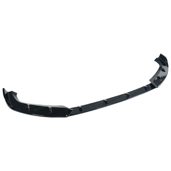 Low angle shot showing the aggressive ground clearance of the SuperAutoUSA XM front lip