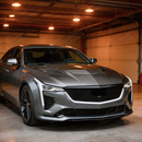 Cadillac CT5 with new SuperAutoUSA real carbon fiber hood parked in a professional detailing bay