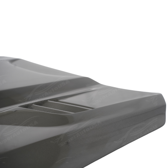 Close-up highlighting the ripple-free, mirror-like surface of premium SuperAutoUSA carbon
