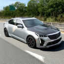 Sleek carbon fiber hood panel installed on a Cadillac CT5-V
